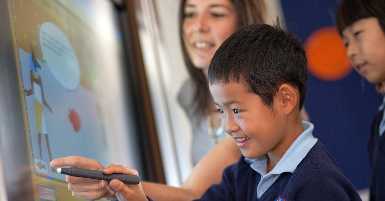 young student working with his teacher